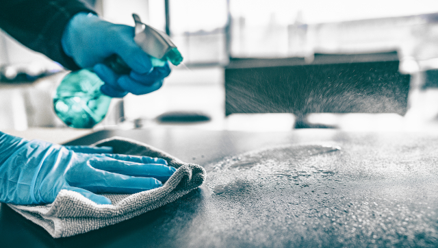Cleaning,Home,Table,Sanitizing,Kitchen,Table,Surface,With,Disinfectant,Spray Cleaning,Home,Table,Sanitizing,Kitchen,Table,Surface,With,Disinfectant,Spray